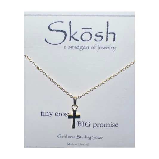 This handmade Cross Necklace is crafted with gold over sterling silver for a luxurious look. The delicate pendant showcases your faith with a dainty cross design, creating a timeless and elegant piece.