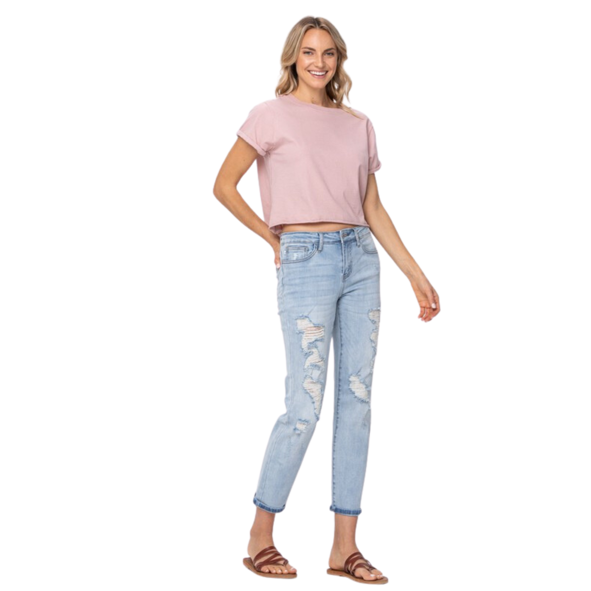 These mid-rise Destroyed Boyfriend Jeans by Judy Blue make a great addition to any wardrobe. The light wash denim pairs well with a variety of looks, providing a unique twist to your favorite styles. Flexible yet durable, these jeans are perfect for dressy occasions or casual weekend wear.