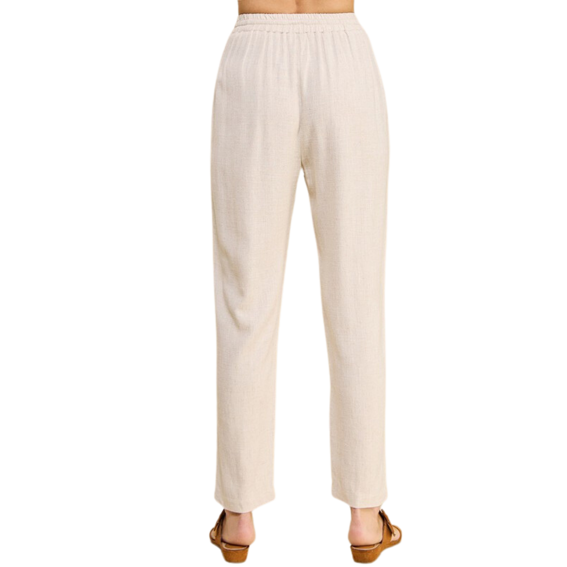 Our Elastic Waist Soft Linen Pants are the perfect blend of comfort and style. Crafted from lightweight and breathable linen blend fabric with an elastic waistband and cropped length, they are an ideal addition to any modern wardrobe. Choose from black or natural colors.
