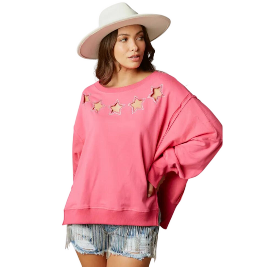 This Embellished Star Cut Out Sweatshirt is a trendy addition to any wardrobe. Constructed from a soft, pink fabric, this long-sleeved top features a unique cut-out and star embellishment for a fashionable, yet comfortable look. Perfect for a day out or lounging around the house.