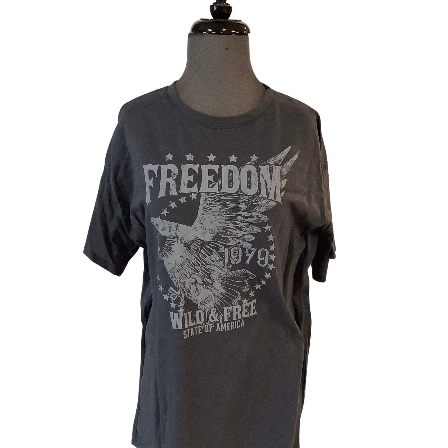 This lightweight graphic tee is perfect for expressing your love of freedom. It features the word "Freedom" in white lettering against a dark grey background, making it the perfect addition to any wardrobe.