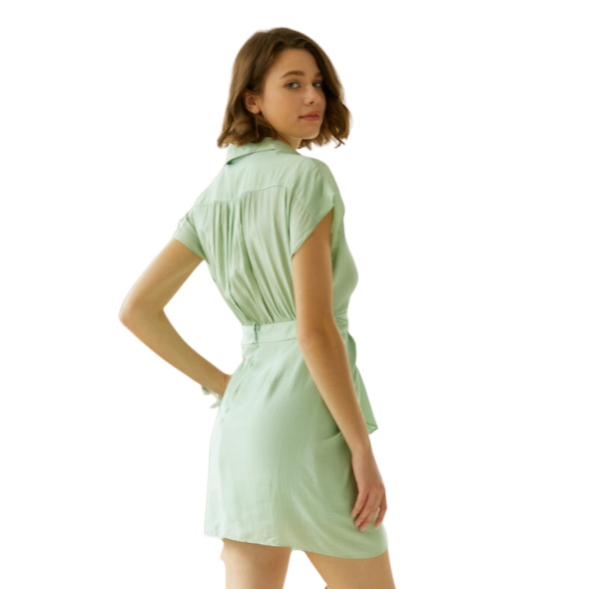 The Front Twist Overlay Dress is the perfect summer essential. Crafted in a bright sage color, this mini dress features a stylish twist front overlay and short sleeves for a cool, fashion-forward look. Make a statement this season with this unique piece.