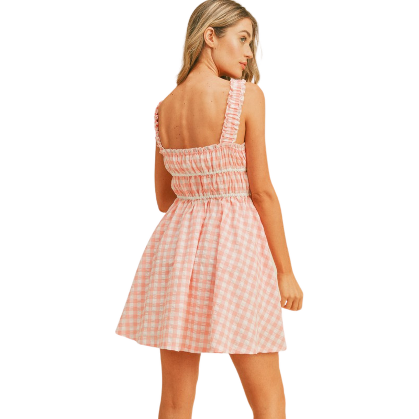 Stay comfortable and on-trend this summer with the Gingham Flared Dress. This flattering mini dress features a classic gingham print in a stylish pink and white color combination. Perfect for both casual and dressier occasions, you'll love this must-have summer look.