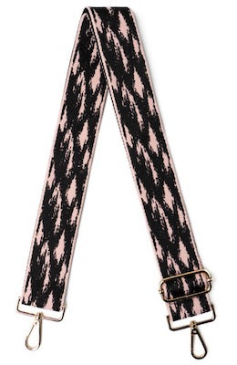 The Kedzie Interchangeable Purse Strap is a great accessory for any purse. It features a stylish pink and black design and adjustable, snap-on buckles for easy attachment. Create a unique look in seconds with this one-of-a-kind strap.