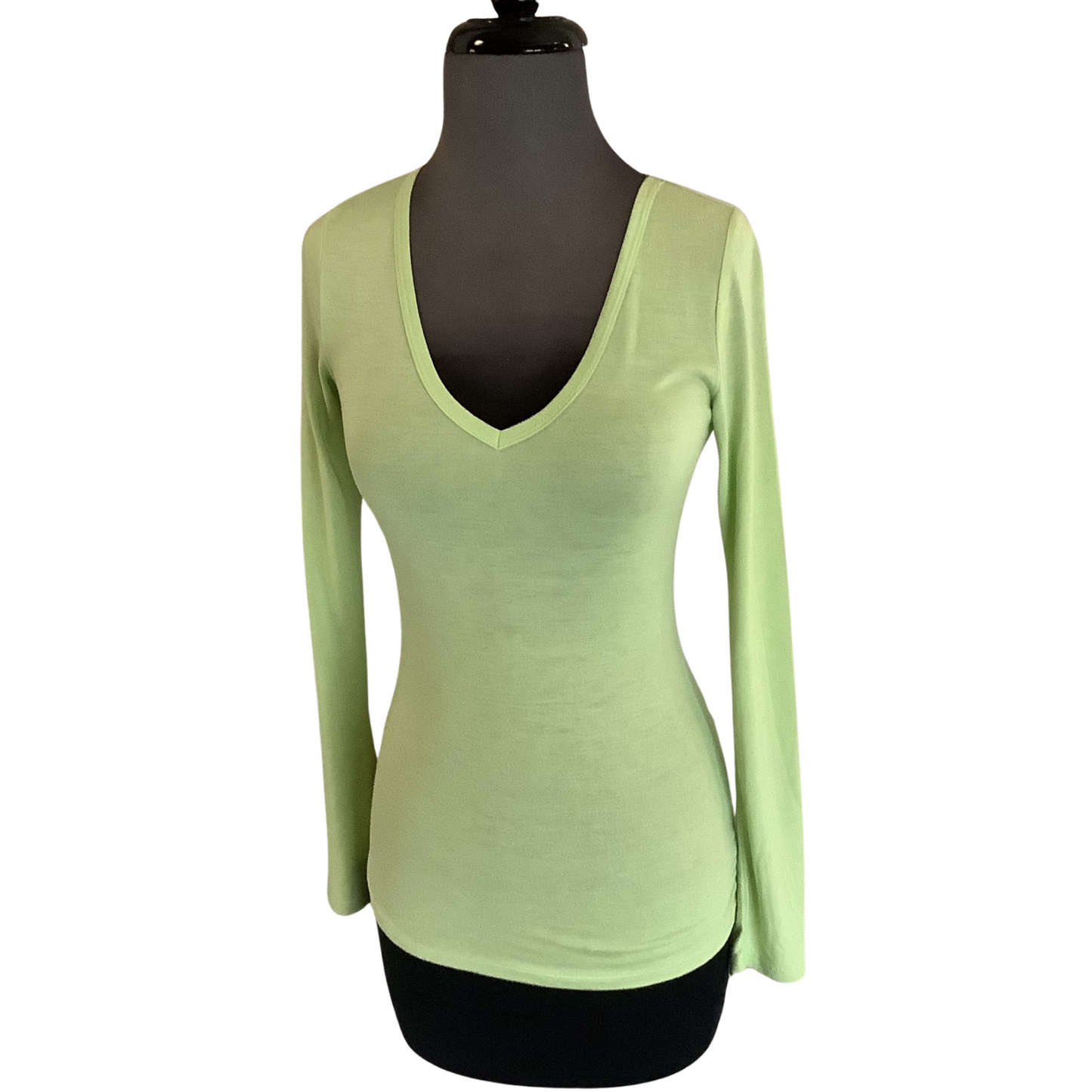 This classic Long Sleeve V-Neck Tee is perfect for any event. Featuring a vivid lime green color, a flattering V-neck and a fitted silhouette, you'll love the timeless style it adds to your wardrobe.