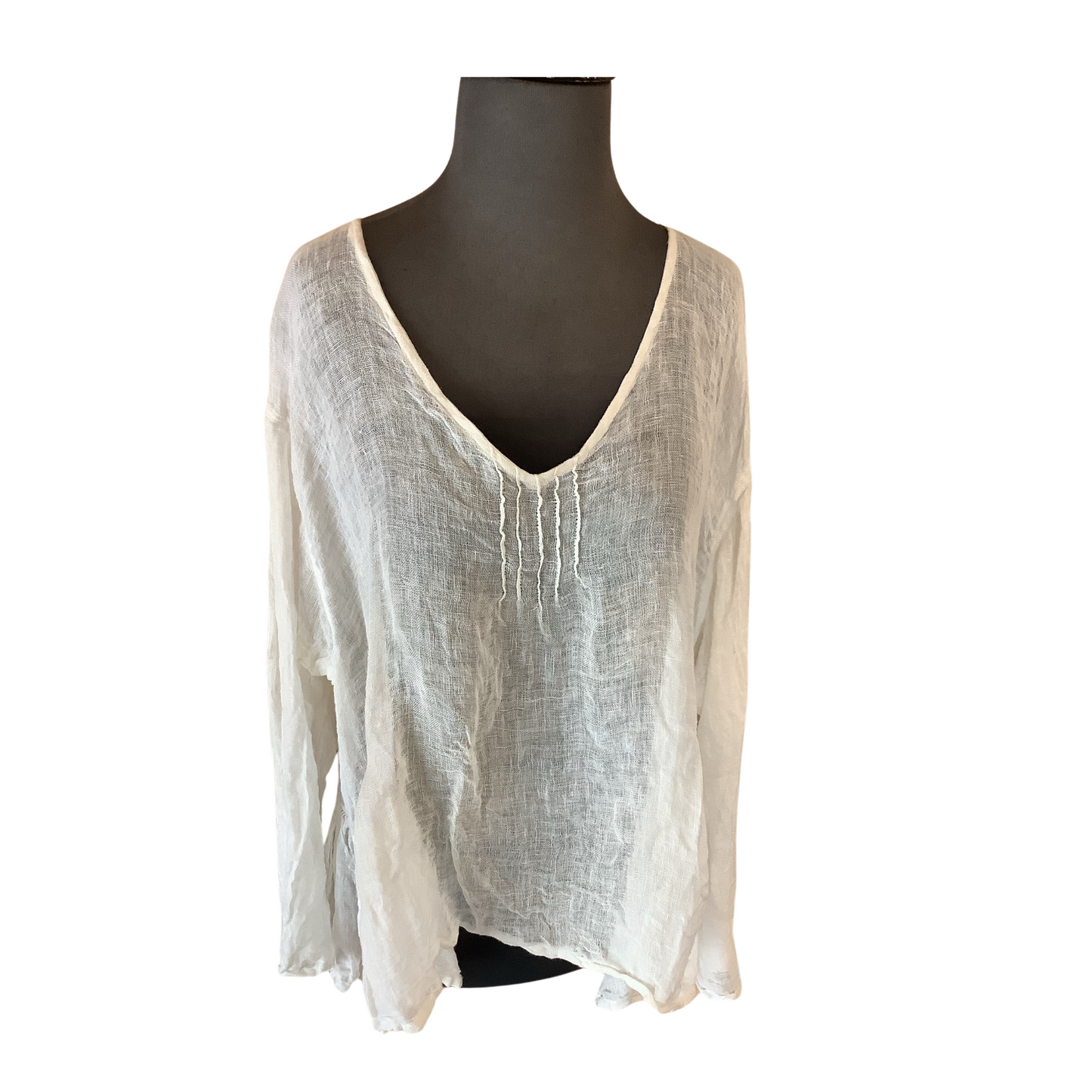 This long sleeve linen top features lightweight material for a breathable, summery look, plus a sheer finish for a stylish, contemporary edge. The long sleeves provide the perfect amount of coverage, while the cream color pairs well with most other wardrobe items.