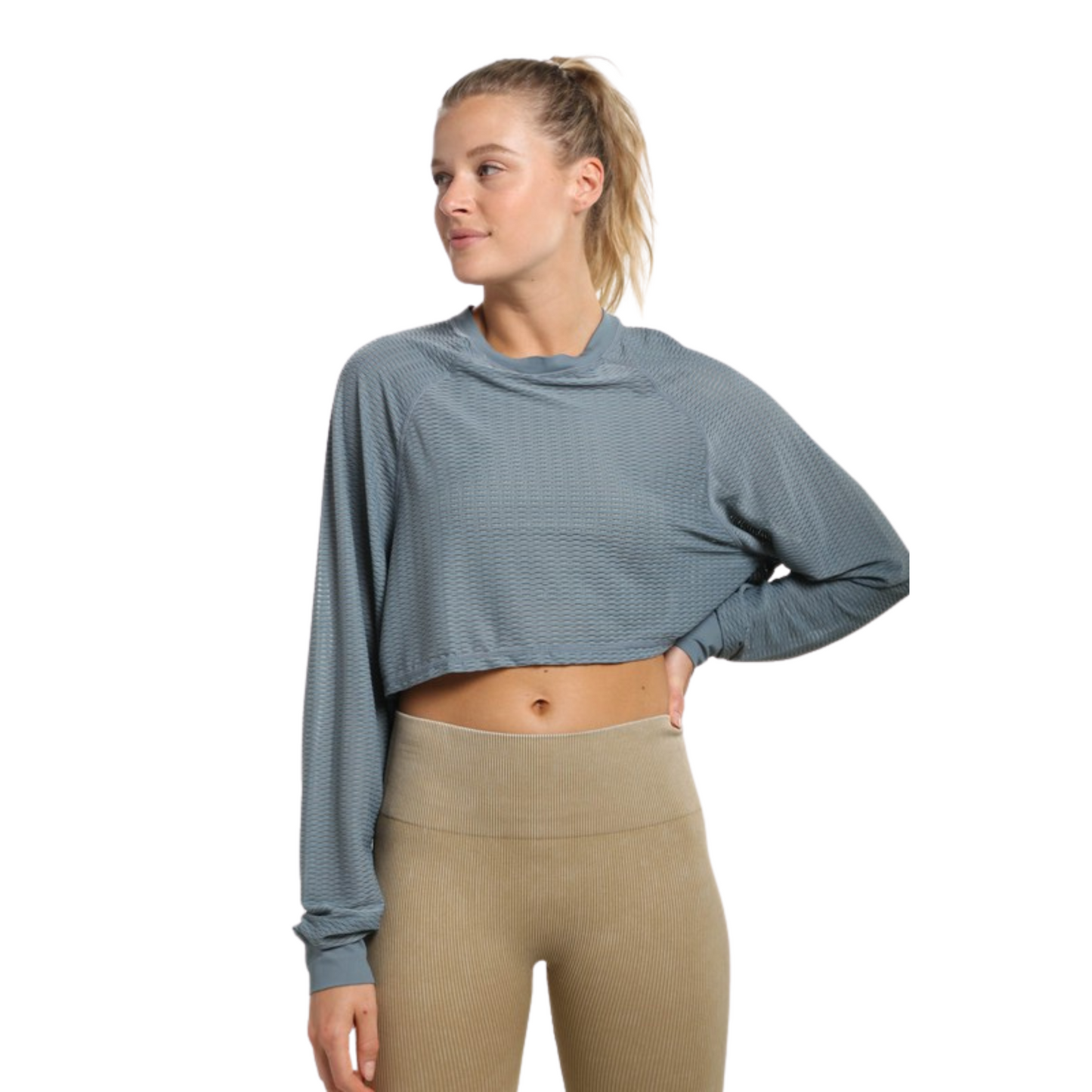 Our Mesh Raglan Cropped Top is a stylish addition to any wardrobe. This top comes in a cool sea green or mauve color with a cropped length and long sleeves. The breathable mesh fabric ensures all-day comfort.