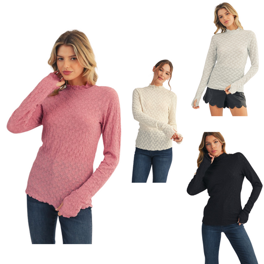 This Mock Neck Lace Top by Jodifl offers a sophisticated sheer design with long sleeves featuring thumbhole details for added comfort and style. Available in elegant blue or mauve, it combines delicate lace with practical elements, enhancing both your wardrobe versatility and wearability. Perfect for layering or as a standout piece.