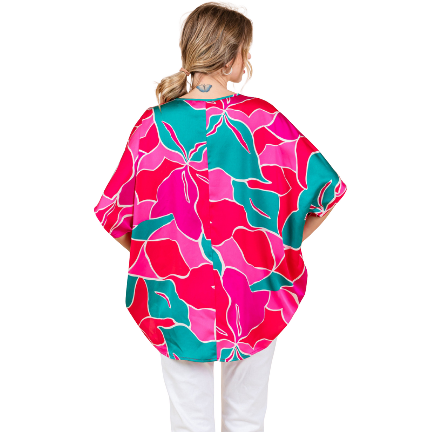 Expertly designed with a vibrant multicolor print, this Short Sleeve Abstract Top is a must-have for any fashion-forward wardrobe. The wide V-neck and short sleeves offer a stylish and comfortable fit, while the pink and turquoise mix adds a playful touch. Perfect for any occasion, this top is sure to make a statement.