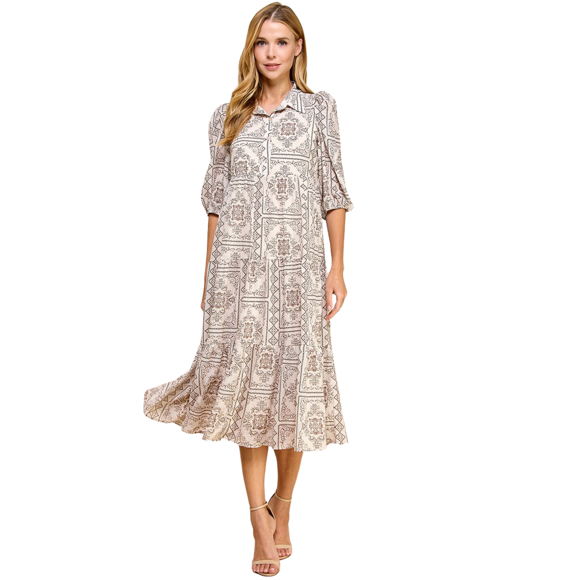 Elevate your wardrobe with our T.C.E.C. Abstract Print Shirt Dress. This collared midi dress features a unique, abstract print that exudes sophistication. With half sleeves and a tiered skirt, this dress is versatile and stylish. Stand out from the crowd with this must-have dress."