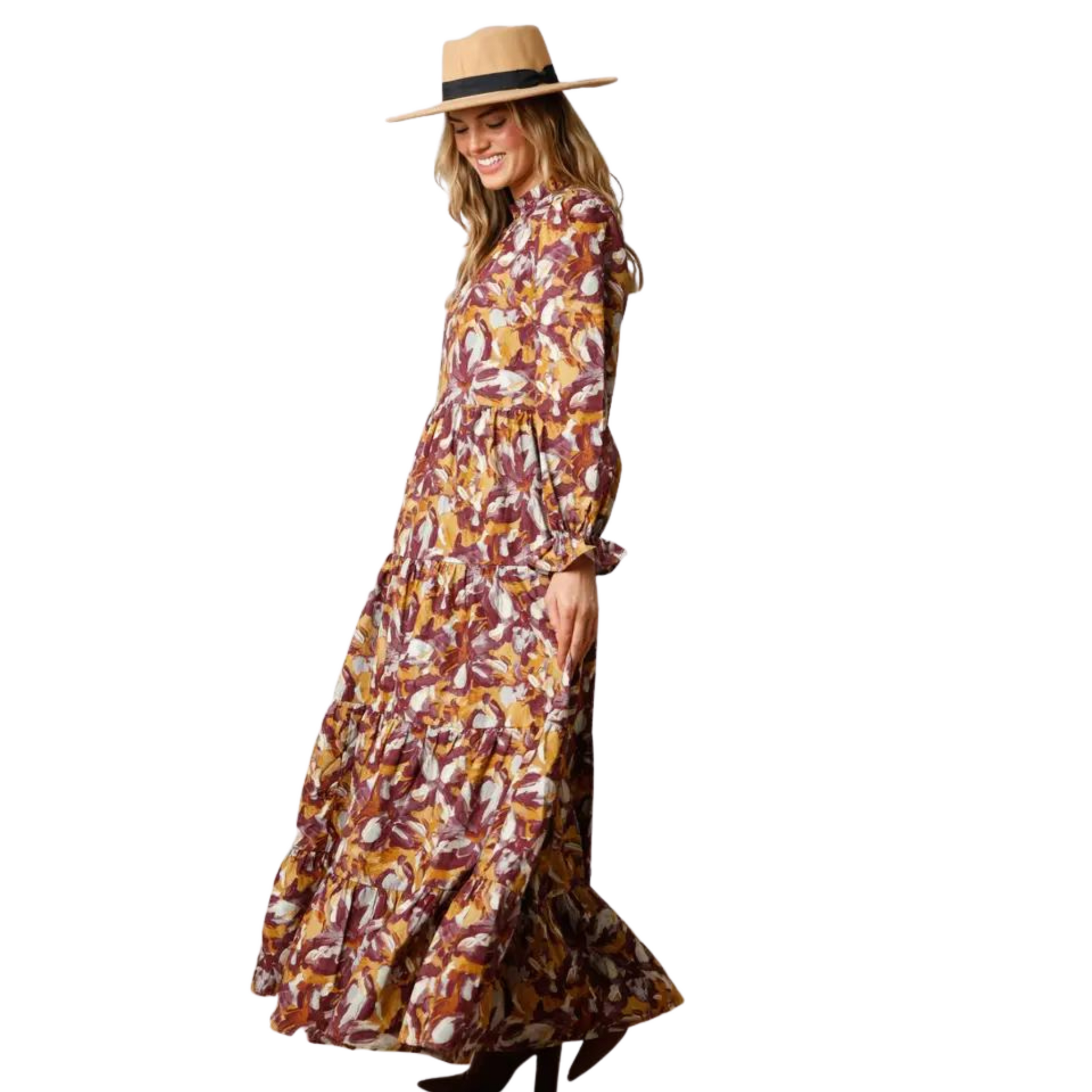 This Abstract Print Maxi Dress offers a classic and sophisticated silhouette with modern details. Featuring a ruffled mock neck, back button keyhole closure, and long balloon sleeves, this dress is designed to flatter any figure. The breathable and lightweight fabric allows you to stay comfortable throughout the day.