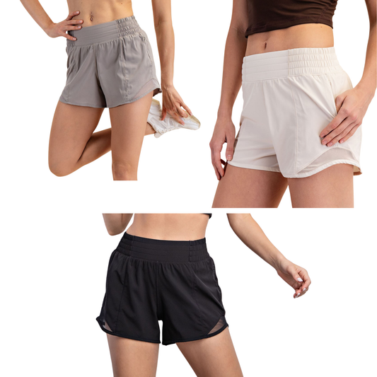 Active Shorts With Mesh Designed for movement and comfort, these shorts feature strategic mesh detailing that enhances breathability during workouts or everyday wear. Available in three versatile colorways—black, stone taupe, and white pearl—they pair effortlessly with any athletic or casual outfit. Crafted by Rae Mode, these shorts combine style with functional design for the modern active lifestyle.