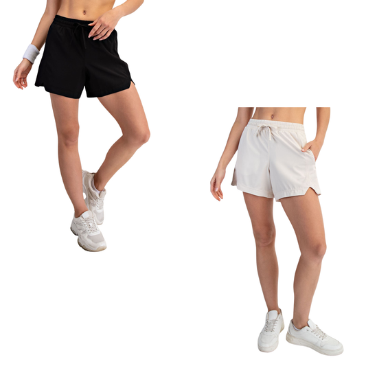 Elevate your active wardrobe with these versatile Active Stretch Woven Shorts from Rae Mode. Designed for comfort and performance, they feature a soft elastic waistband and adjustable drawstring for a customized fit. The breathable woven fabric moves with you through workouts, errands, or casual days. Available in crisp White Pearl or sleek Black, these shorts are a wardrobe essential that transitions seamlessly from gym to street.