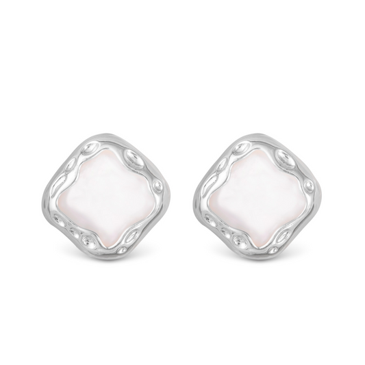 Expertly crafted from silver, these Amanda Mother of Pearl Studs feature a chic square design and lustrous mother of pearl. With their versatile and elegant style, these stud earrings are the perfect accessory for any occasion. Elevate your outfit with a touch of sophistication and timeless beauty.