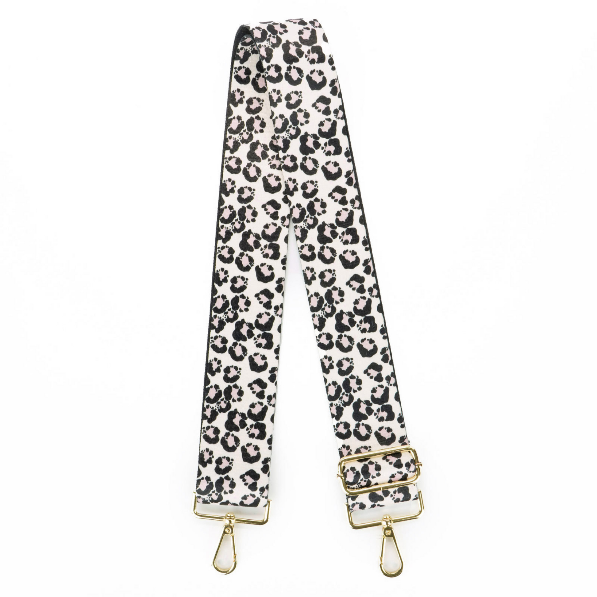 white and black leopard print purse strap with pink accents. Adjustable and interchangeable
