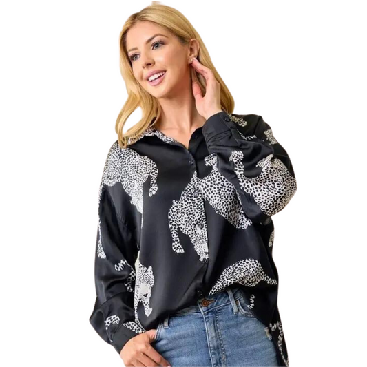 Our Animal Print Button Up Top is sure to turn heads. Crafted from lightweight fabric, this long sleeve top features a bold all-over animal print and a stylish button-down detail at the front and collar. Style it with your favorite jeans to complete the look.