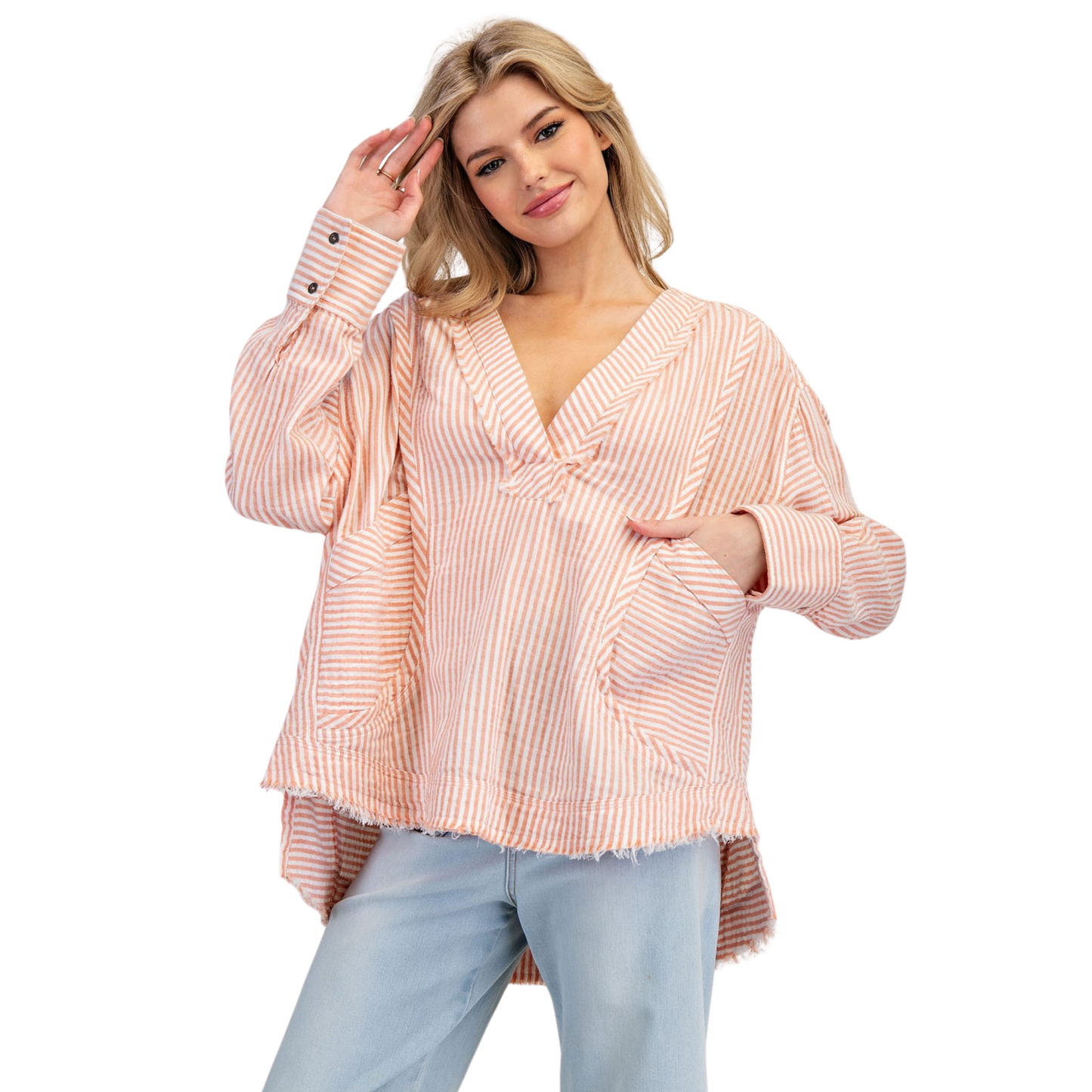 This Mineral Washed Long Sleeve Top in apricot color offers a striped design with a v-neck, providing both style and comfort. Made with a mineral wash for a unique finish. Perfect for a casual everyday look.