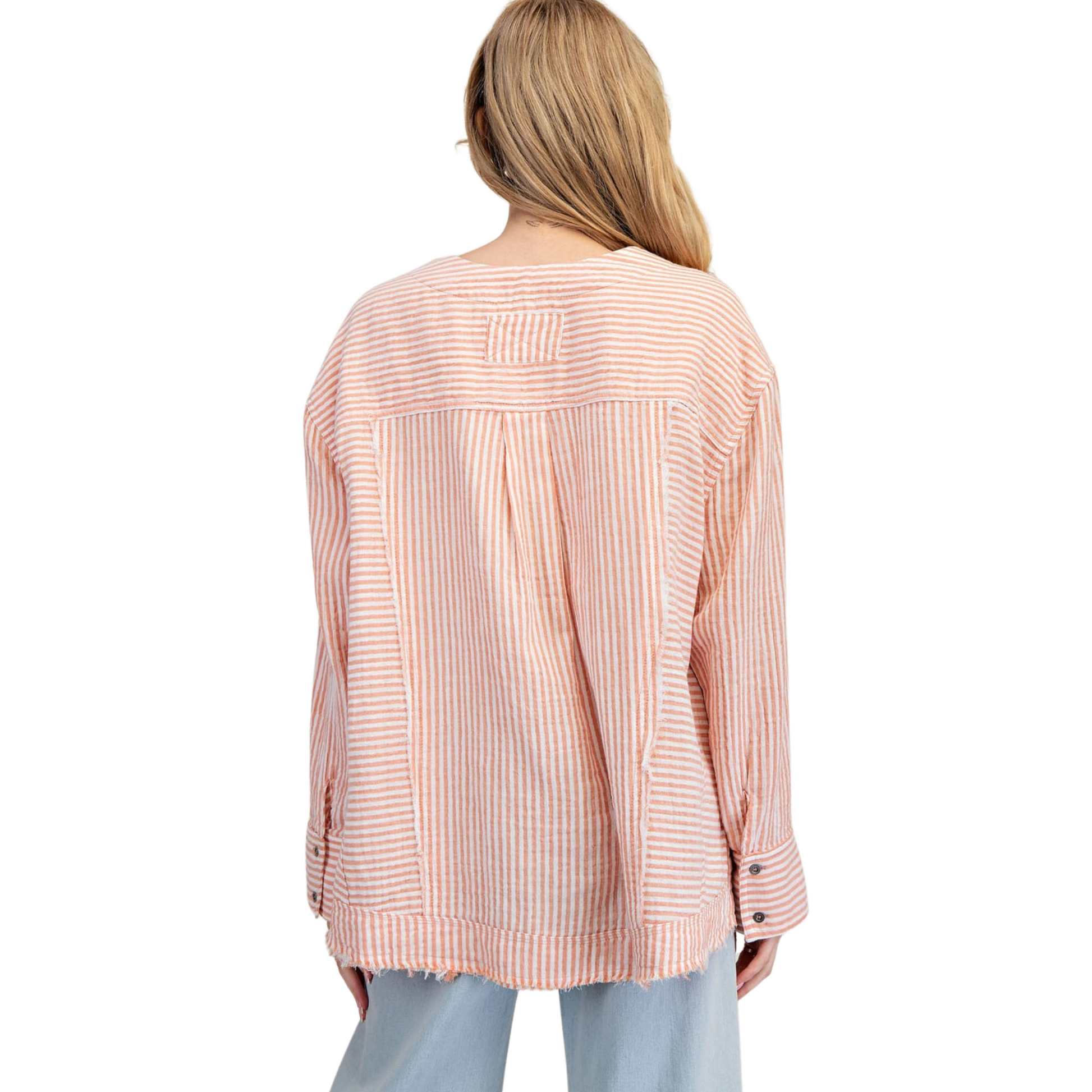 This Mineral Washed Long Sleeve Top in apricot color offers a striped design with a v-neck, providing both style and comfort. Made with a mineral wash for a unique finish. Perfect for a casual everyday look.