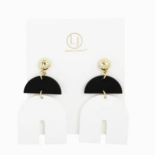 These black and white Clay Arch Earrings feature an elegant arch design and dangle style, making them the perfect accessory for any occasion. Handcrafted with care, these earrings add a subtle touch of sophistication to any outfit. Elevate your style with these unique and versatile earrings.