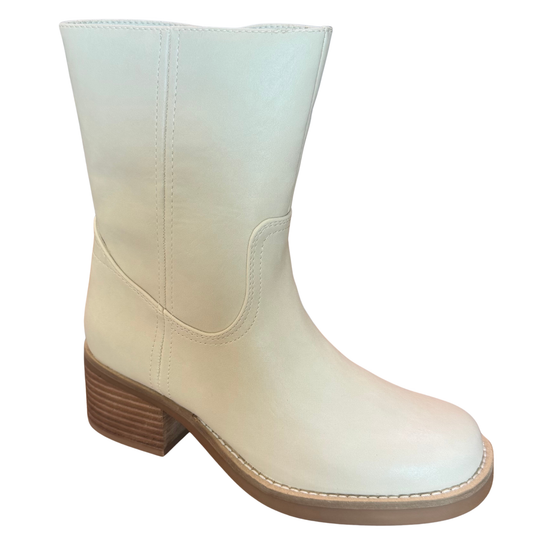 The Augustin bootie heel from Mia brings effortless elegance to your everyday rotation. Crafted in a versatile cream color, this style pairs seamlessly with dresses, jeans, or trousers. The classic bootie silhouette offers comfort and support while adding a polished touch to any outfit. A must-have for transitional seasons and year-round styling.
