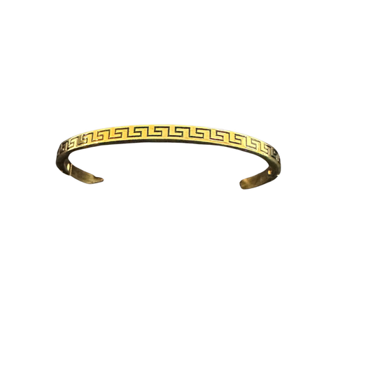 Elevate your jewelry collection with this striking Aztec Cuff Bangle from Perdido Gems. Crafted in lustrous gold, this open cuff design features intricate Aztec-inspired patterns that showcase exceptional artisanal detail. The versatile open cuff style adapts to various wrist sizes for a comfortable, personalized fit. Perfect for layering or wearing solo, this statement piece brings timeless sophistication and cultural richness to any ensemble.