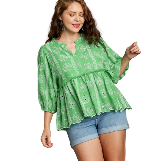 Expertly crafted in a beautiful apple green, this plus size embroidered babydoll top features a flattering v-neckline. Perfect for any occasion, this top adds a touch of elegance and style to any outfit. Dress it up or down, this top is a must-have for any wardrobe.