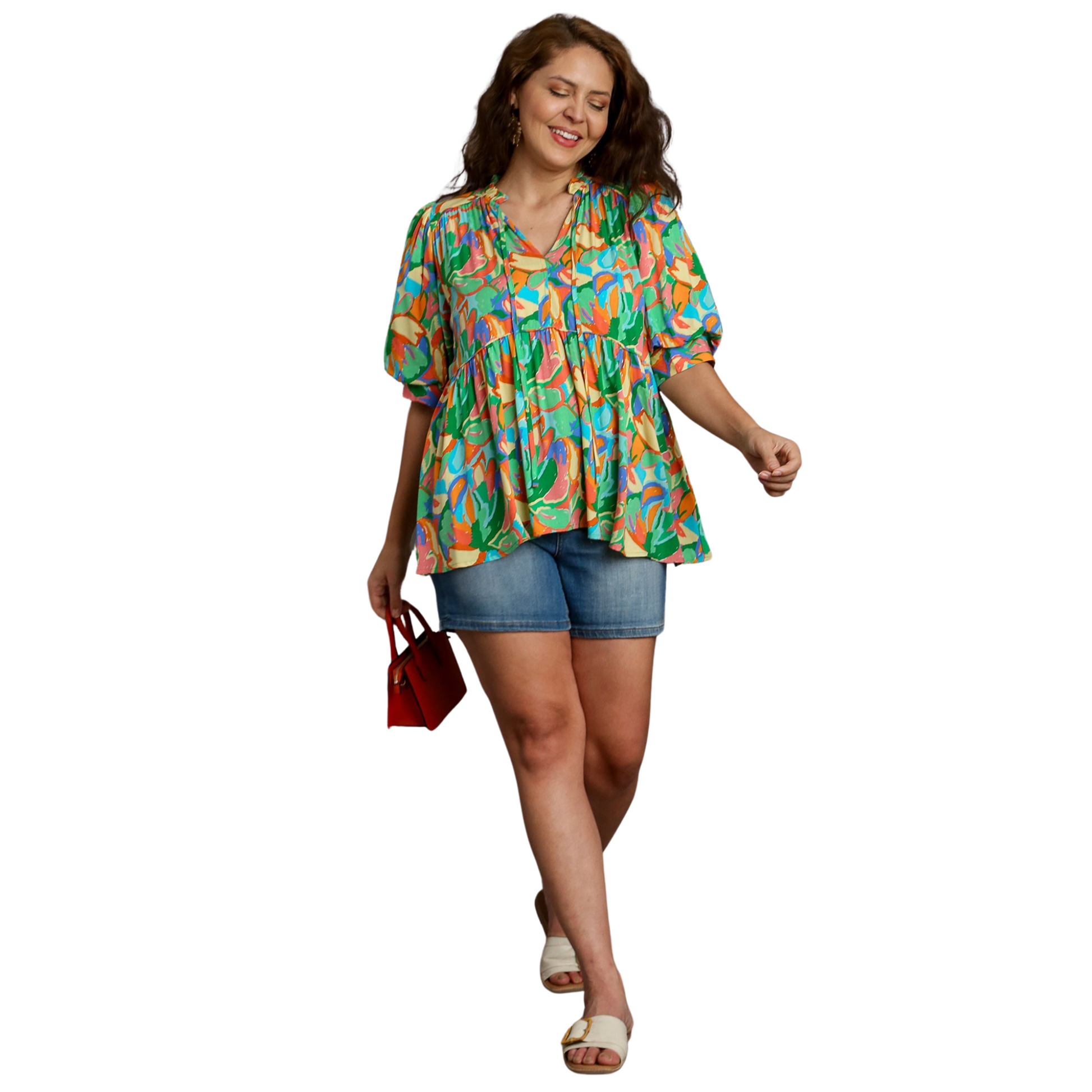 This plus size babydoll top features a unique abstract print in a captivating green mix. Perfect for adding a touch of creativity to your wardrobe, while still providing a flattering fit. A must-have for any fashion-forward individual looking for a statement piece.