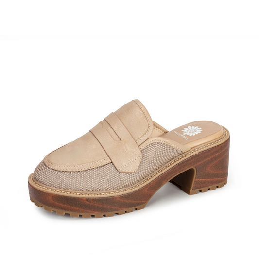 The Barclay platform clog by Yellowbox combines natural color tones with a stylish open-back design for easy wear. Its elevated platform offers added height and comfort, making it a versatile choice for both casual and dressier occasions. Crafted to provide support and breathability, this clog is an expert pick for those seeking a blend of fashion and function.