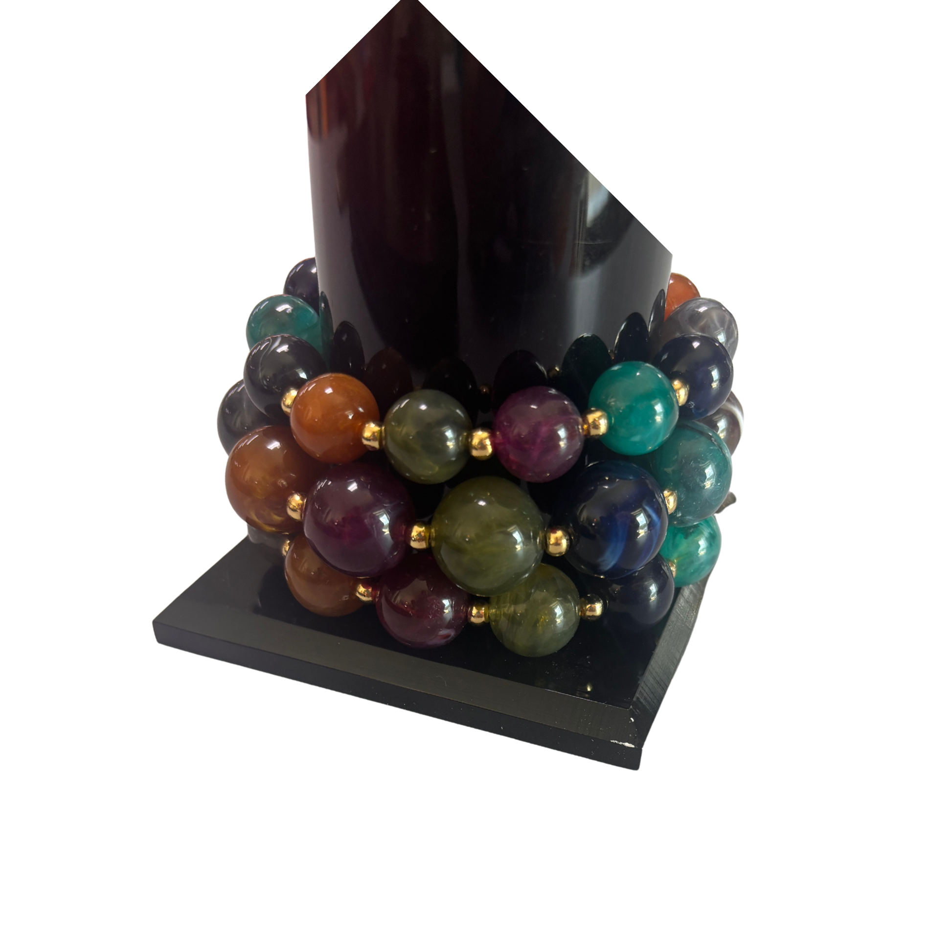 Elevate your wrist game with this stunning set of three multicolor beaded bracelets from Perdido Gems. Each bracelet features vibrant beads paired with elegant gold accents, creating a versatile look that transitions seamlessly from casual to dressy. The stretchy design ensures a comfortable, adjustable fit for any wrist size. Mix and match the three styles or stack them together for maximum impact. 
