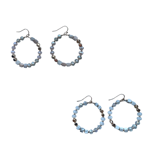 Elevate your everyday look with these stunning Beaded Hoop Earrings from All That Glitters. Each pair features delicate beading that catches the light beautifully, creating an eye-catching dangle effect. Choose between soft pink or classic white to match your personal style. Perfect for adding a touch of sparkle to any outfit, these versatile earrings transition seamlessly from day to night. Lightweight and comfortable for all-day wear.