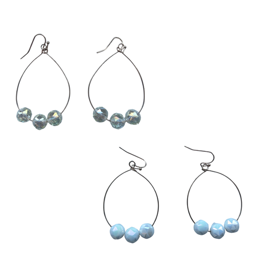 Elegant beaded hoop earrings by Pomina, crafted to elevate any look. Choose between crisp white or clear beads set in lustrous gold hoops for a versatile accessory that transitions seamlessly from day to night. Perfect for stacking or wearing solo, these timeless pieces add a touch of sophistication to your jewelry collection.