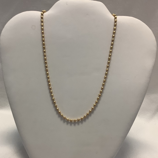 This elegant and timeless beaded necklace and earring set features gold beads and a short necklace. The stud earrings will complete the look with a subtle sparkle. Perfect for any occasion, this set will bring a sophisticated touch to any outfit.