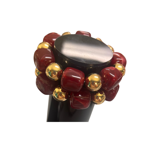 Elevate your wrist game with this stunning set of two stretchy bracelets from ETE. One features vibrant red beads, while the other showcases luxurious gold tones. Perfect for layering or wearing individually, these versatile pieces add a pop of color and elegance to any outfit. The stretchy design ensures a comfortable, adjustable fit for all wrist sizes. Mix and match with your everyday style or dress them up for special occasions.
