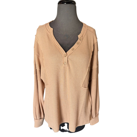 This V-Neck Knit Henley Top is crafted from a soft, solid knit fabric and features a V-neck, long sleeves, and a button-up front. It is finished with raw edge detail and provides an easy, comfortable wear. Perfect for everyday wear, it's available in a classic beige shade.