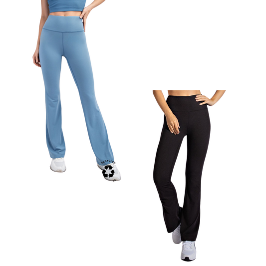 Elevate your yoga practice with these luxuriously soft bell bottom pants from Rae Mode. Crafted in butter-soft fabric, they feature a flattering high-waisted design that provides comfort and support through every pose. The flowing bell bottom silhouette adds a touch of retro-inspired style to your activewear collection. Available in classic black or soothing dusty blue, these versatile pants transition seamlessly from studio to street. Perfect for yogis who refuse to compromise on comfort or style.