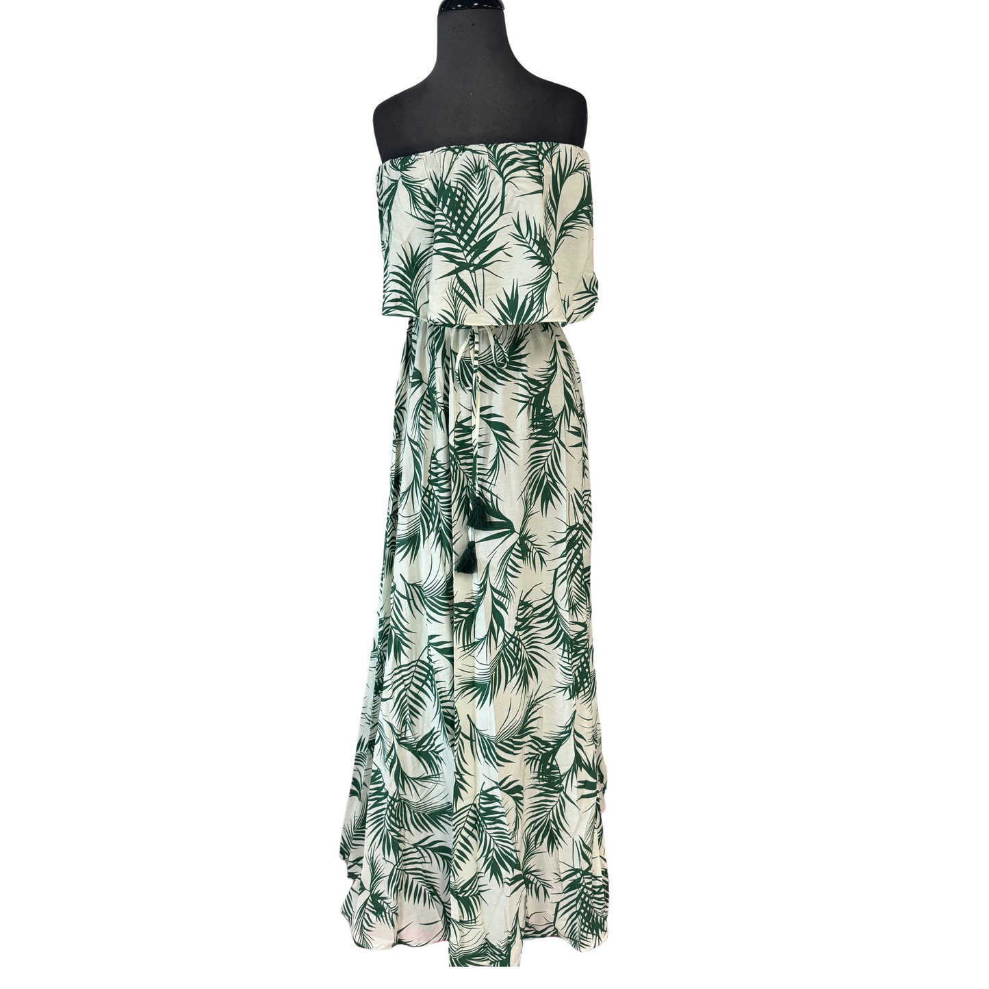 Elevate your style with our belted maxi dress in a stunning green/ivory mix. The tropical print adds a touch of exotic flair to this elegant strapless dress. With an elastic waist, you'll enjoy a comfortable fit while looking effortlessly chic. Perfect for any occasion.