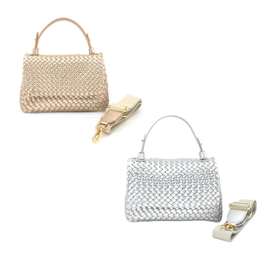 The Berlin Bag, crafted by BC Bags, is a small purse available in silver or gold. With a chic woven design, this bag is the perfect accessory for any outfit. Elevate your style with this trendy and versatile bag.