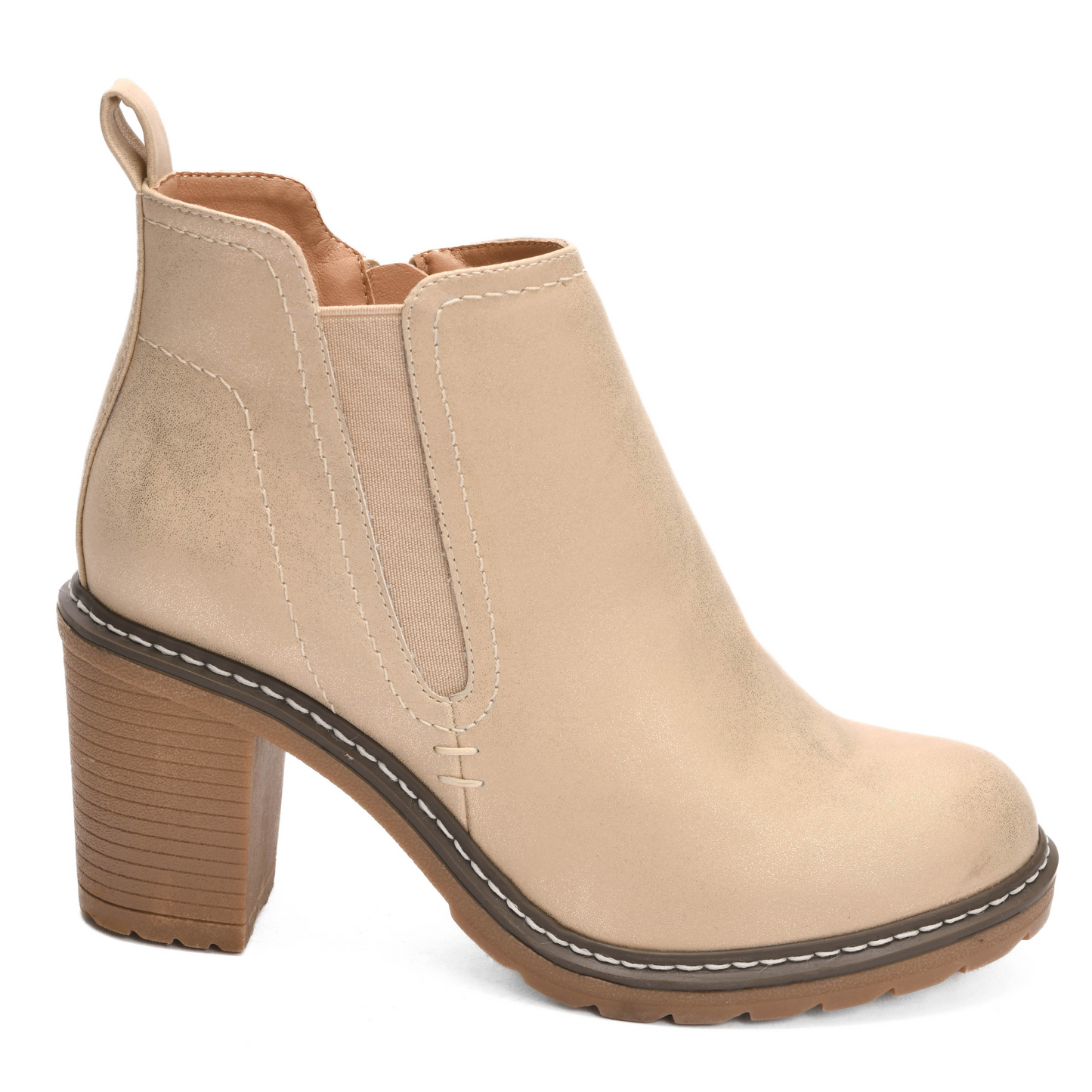 Experience the height of fashion and comfort with Bite Me, our stunning high heel bootie from the renowned Corkys brand. The gold color adds a touch of luxury to any outfit, while the expertly-designed heel provides both style and support for a comfortable all-day wear.