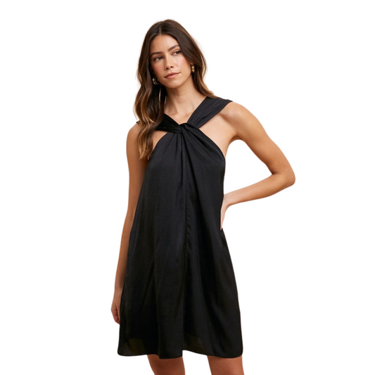 Expertly designed with a halter neckline and inner lining, this dress offers both style and comfort. A side concealed zipper and tie neck add an elegant touch, while the satin effect flowy fabric and relaxed fit provide a chic and flattering look. Upgrade your wardrobe with this must-have halter mini dress.