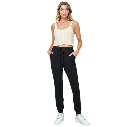 Stay comfortable and stylish with our Casual Jogging Pants. Made with a soft knit material, these full-length joggers are perfect for everyday wear. The classic black color adds a touch of versatility to your wardrobe. Look effortlessly cool in these casual pants.