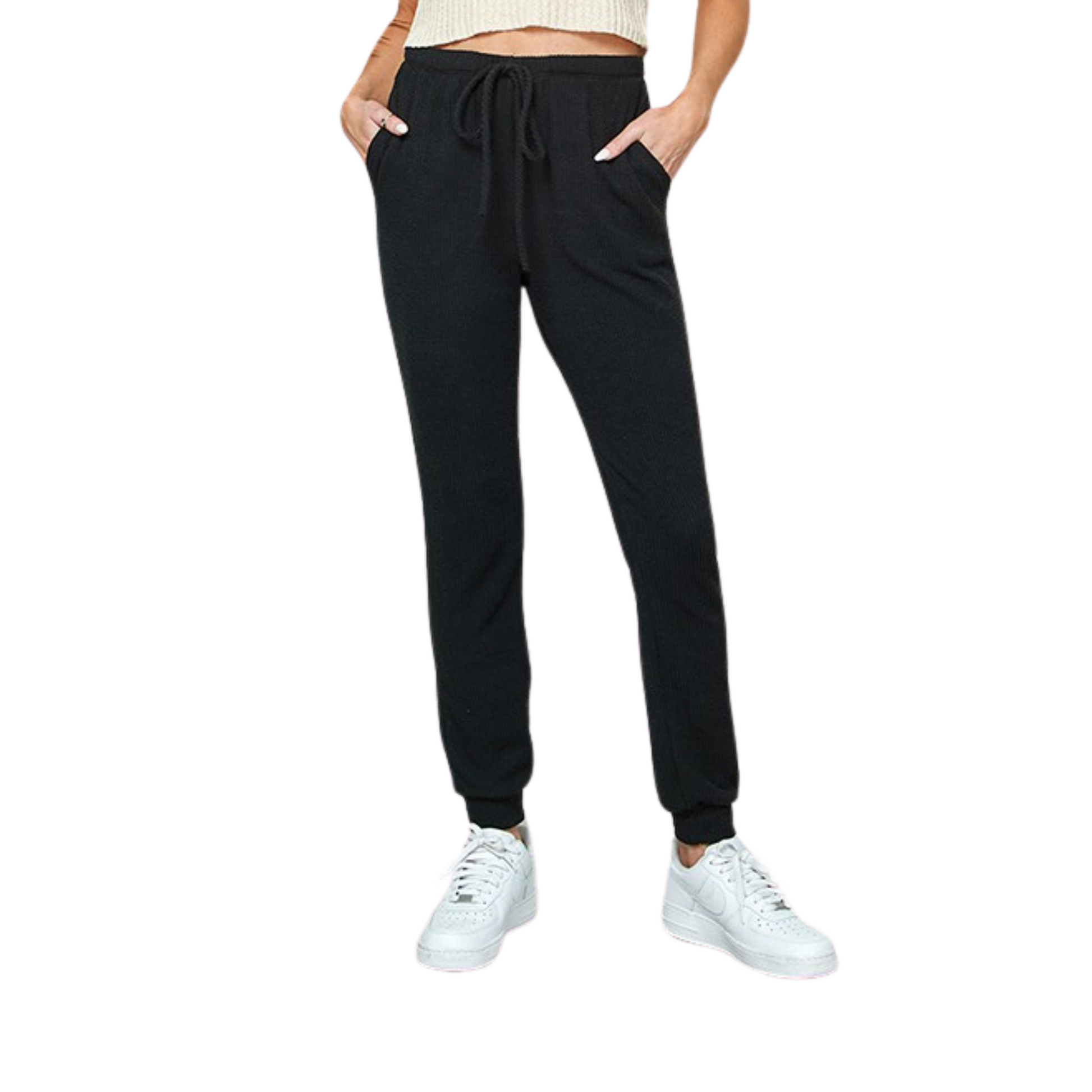 Stay comfortable and stylish with our Casual Jogging Pants. Made with a soft knit material, these full-length joggers are perfect for everyday wear. The classic black color adds a touch of versatility to your wardrobe. Look effortlessly cool in these casual pants.