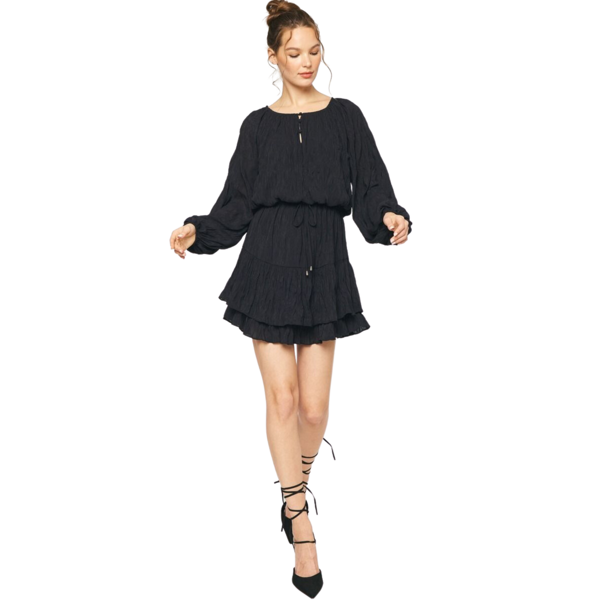 This fashionable long sleeve mini dress is perfect for any occasion. Crafted with textured fabric in classic black and featuring a stylish ruffled hem, a self-tie waist detail and a button-up front, this mini dress will look great on any figure. Lightweight and non-sheer, the dress is also fully lined for a comfortable fit.