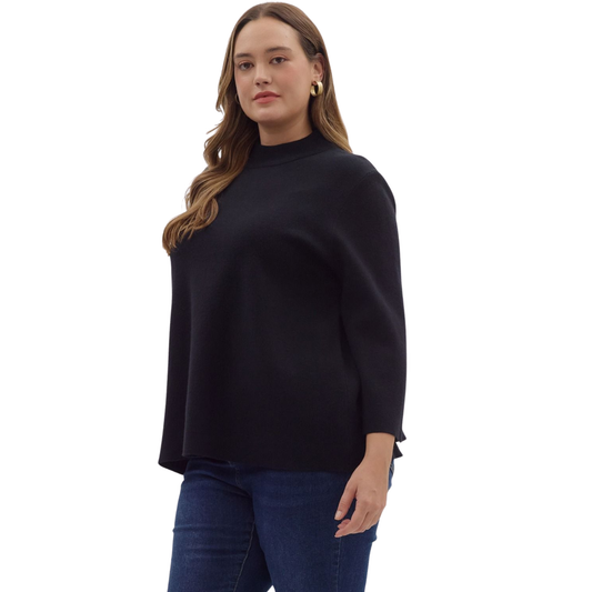 This sleek black top features a sophisticated mock neck and comfortable 3/4 length sleeves, crafted by Entro for a refined fit. Its streamlined silhouette makes it a versatile piece, perfect for layering or wearing alone to elevate your wardrobe with understated elegance.