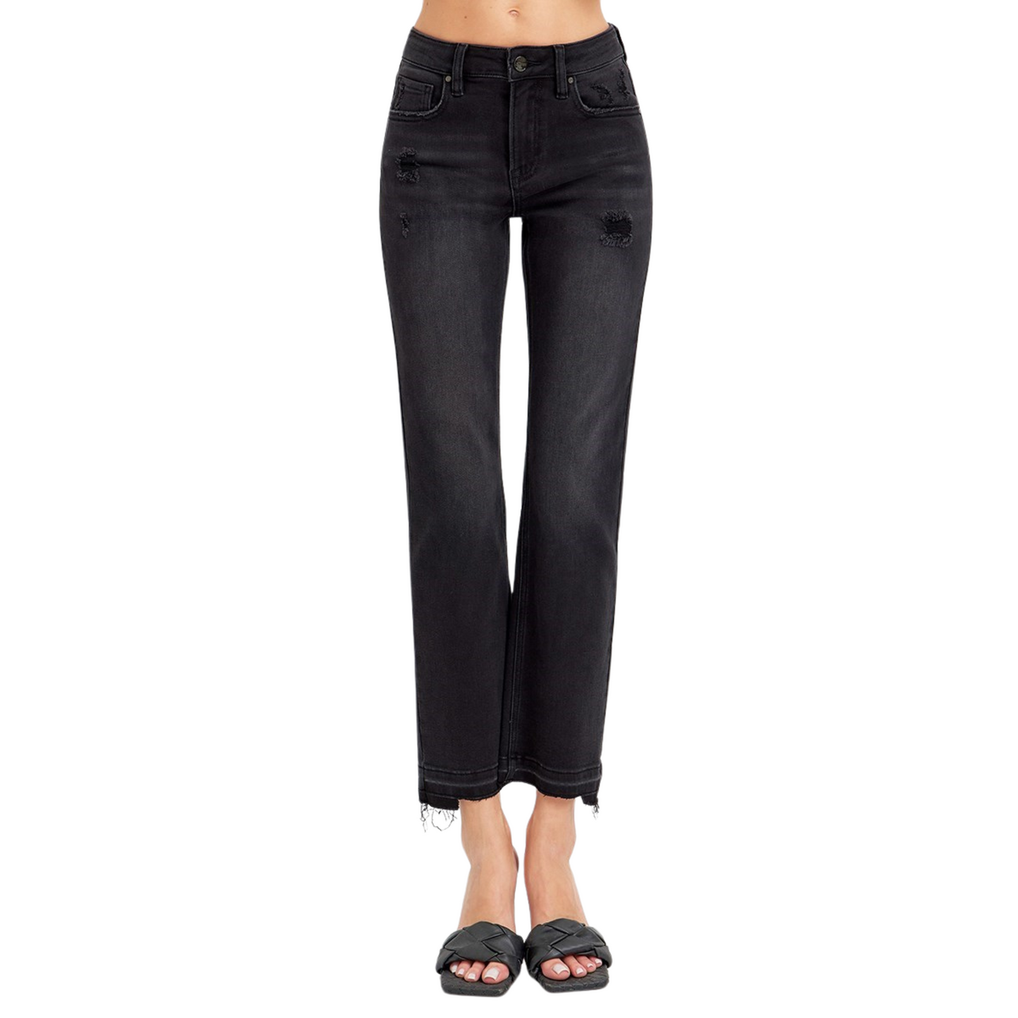 Expertly crafted by the Risen brand, these Mid Rise Uneven Released Hem Jeans feature a flattering mid rise and a versatile cropped length. The black denim fabric adds a touch of sophistication, while the raw hem creates a chic, edgy look. Elevate your wardrobe with these stylish and on-trend jeans.