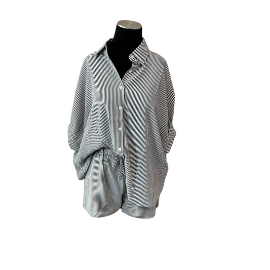 Elevate your casual wardrobe with this HYFVE striped button-up top and shorts set. The collared, short-sleeve top features classic stripes and functional buttons for easy styling, while the matching drawstring shorts offer comfort and adjustability. Perfect for laid-back days, this coordinated two-piece set combines effortless style with versatile black tones that pair seamlessly with your existing pieces.
