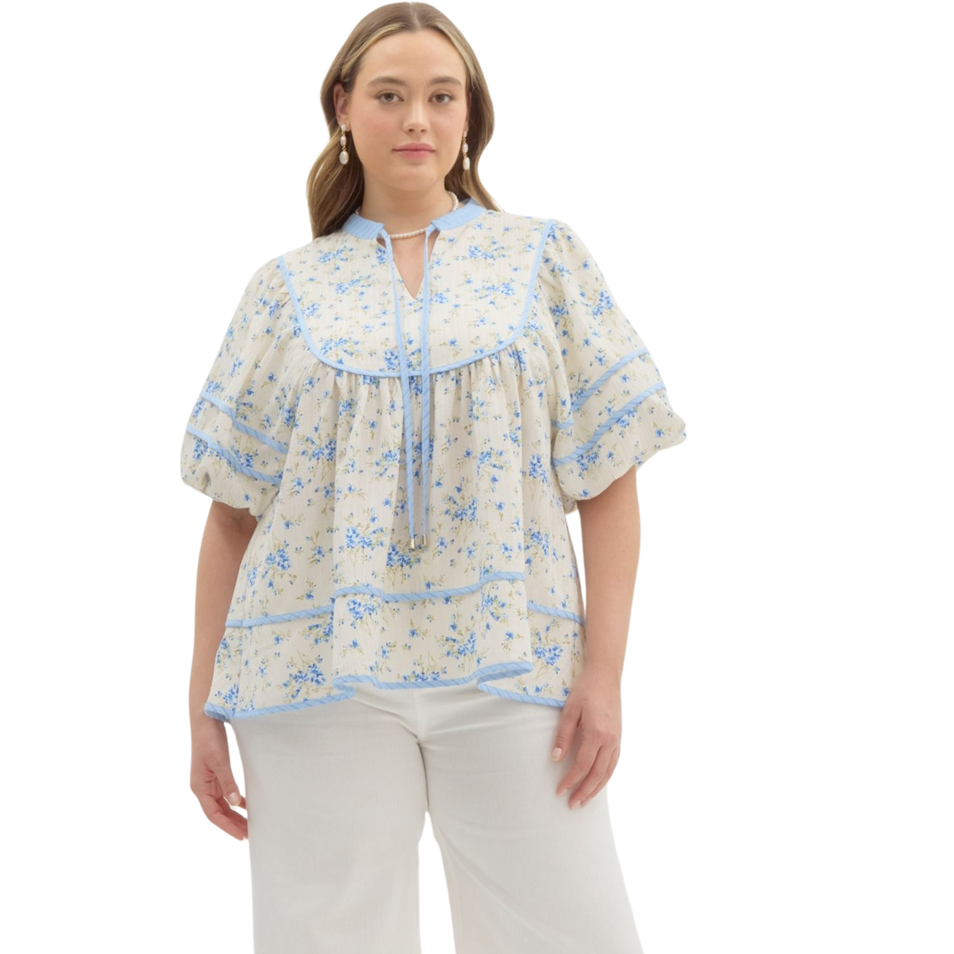 Upgrade your wardrobe with our Floral Print Bubble Sleeve Top. Featuring a beautiful floral print and trendy bubble sleeves, this top will add a pop of color to any outfit. The front tie closure adds a touch of femininity, while the lightweight woven material keeps you comfortable all day. Perfect for any occasion!