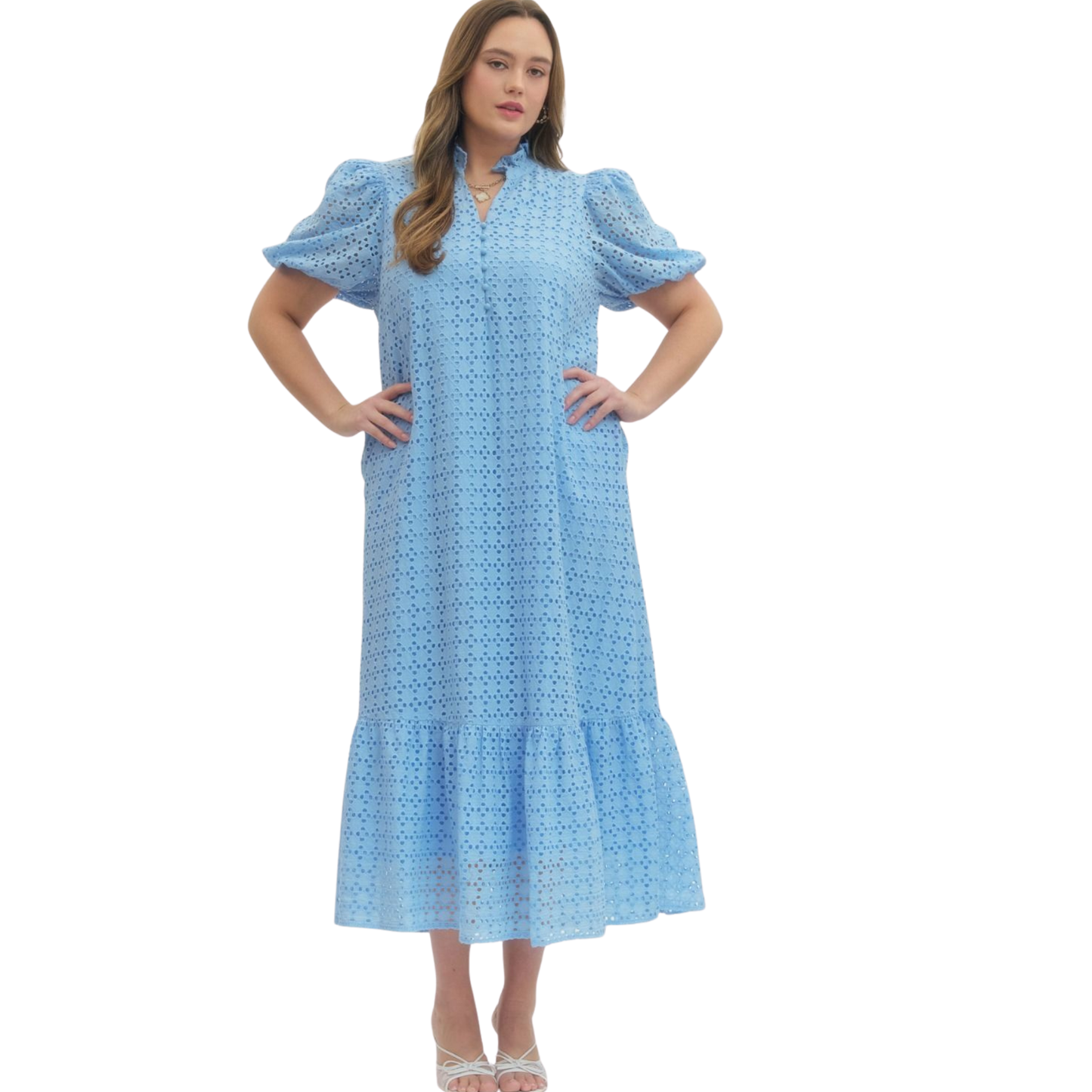 Elevate your wardrobe with this stunning Eyelet Puff Sleeve Midi Dress by Entro. Crafted in a rich blue hue, this piece features delicate eyelet detailing that adds texture and visual interest. The romantic puff sleeves create a flattering silhouette, while the mock neck provides a polished, sophisticated finish. Cut generously for plus-size comfort, this midi dress is perfect for everything from casual outings to special occasions. 