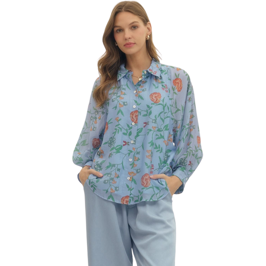 Effortless style meets comfort in this lightweight Entro button-down top. Featuring a charming floral print in soft blue tones, it's designed with a classic collar and front lining for a polished look. Perfect for layering or wearing solo, this versatile piece transitions seamlessly from casual days to dressed-up occasions. The relaxed fit and breathable fabric make it an ideal addition to any wardrobe.