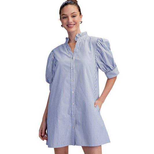 The Glam blue striped button-up mini dress features a charming ruffled collar and dramatic puff sleeves for effortless elegance. Perfect for casual outings or dressed-up occasions, this piece combines playful details with timeless style. The flattering V-neckline and mini length create a modern silhouette that works beautifully with sneakers or heels. A versatile wardrobe essential that transitions seamlessly from day to night.