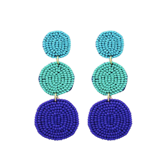 These oval drop earrings are the perfect addition to any outfit. With variations of blue beads along the dangle design, these earrings are sure to bring a touch of elegance and sophistication. The lightweight design ensures maximum comfort and style.